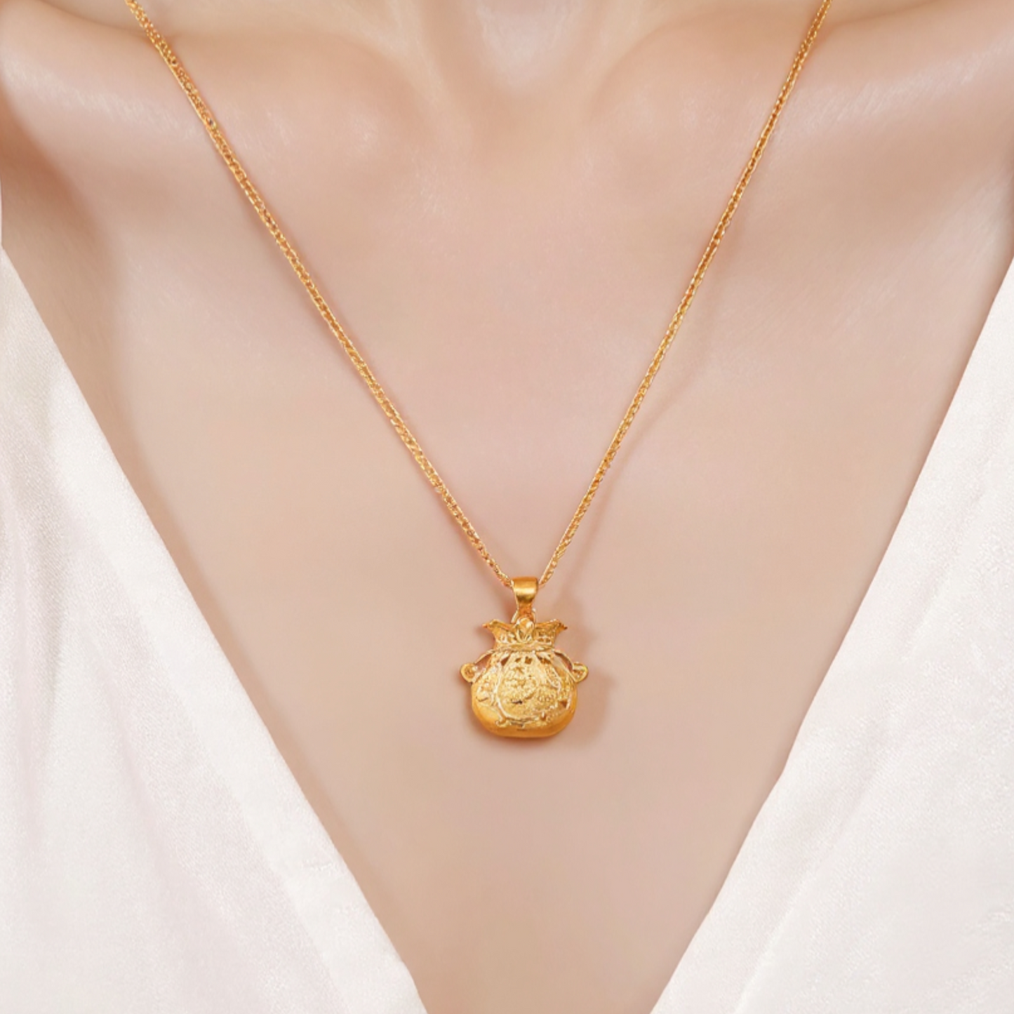 24k Gold Lucky Fu Blessing Coin Bag with Flower Engraved Pendant