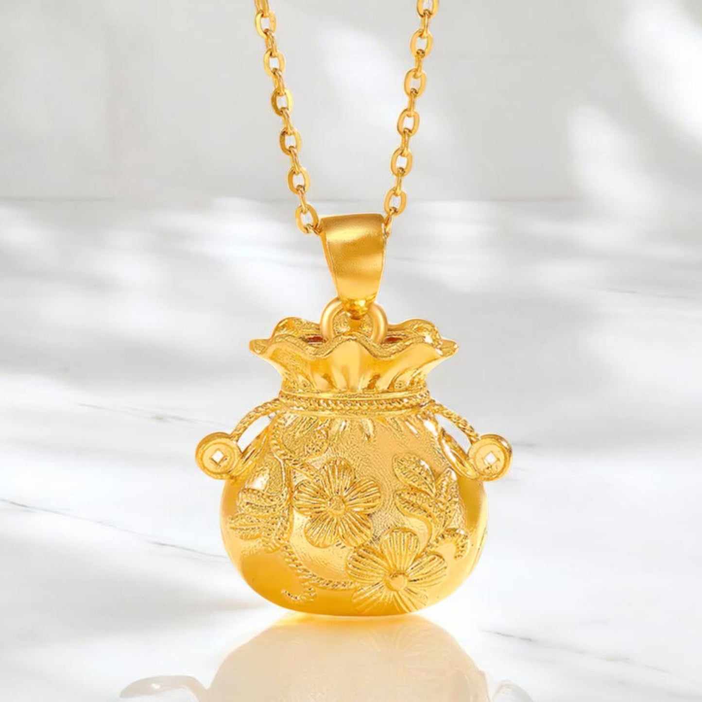 24k Gold Lucky Fu Blessing Coin Bag with Flower Engraved Pendant