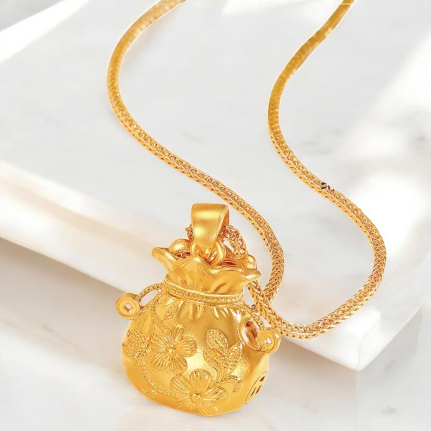 24k Gold Lucky Fu Blessing Coin Bag with Flower Engraved Pendant
