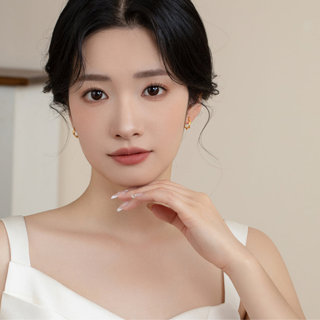 Three-dimensional Twist 18K Gold Wave Brushed Hoop Earrings